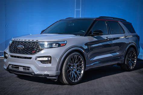 A Ford Explorer ST with lowered suspension and performance wheels, showcasing improved handling.
