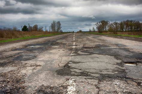Damaged road needing repair