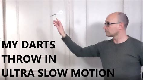 dart throwing technique slow motion