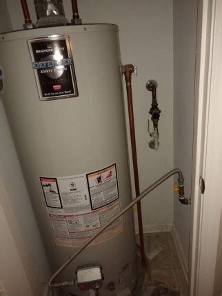 electric water heater leaking from overflow pipe