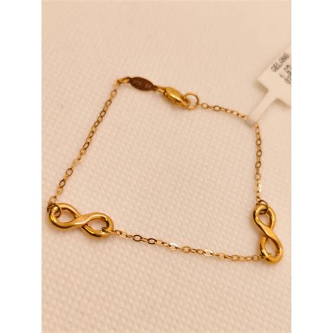 gelang emas simbol infinity