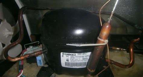 how does a refrigeration compressor unloader work