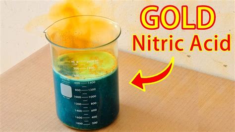 how does gold react with nitric acid