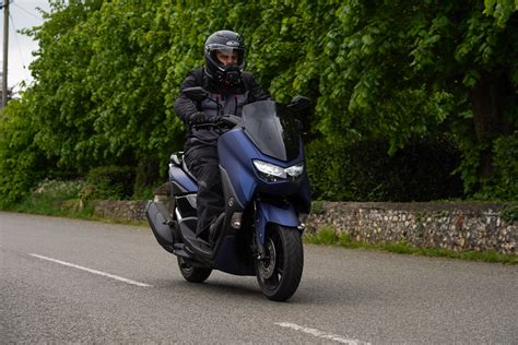 how fast can a 125cc moped go
