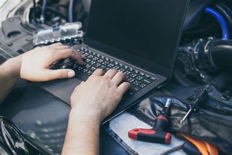 how much does it cost to reprogram a car computer near