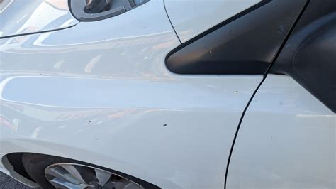 how much to fix a dent in front fender