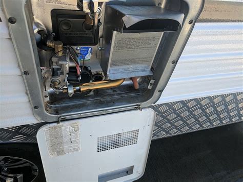 how to change anode in hot water heater in caravan