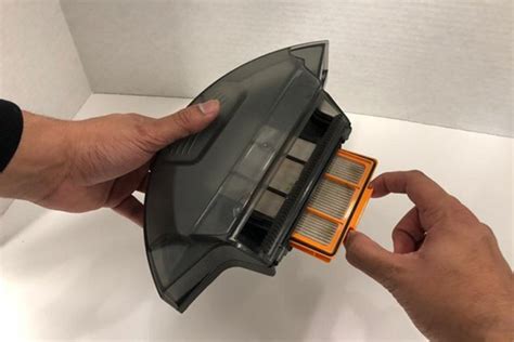 how to change filter on shark robot