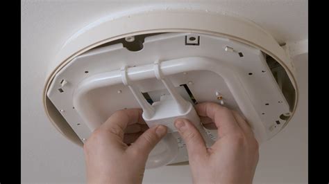 how to change light fitting in bathroom