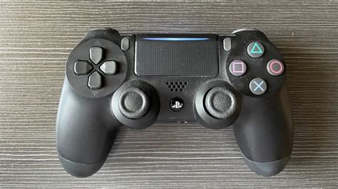 how to change tv volume with ps4 controller