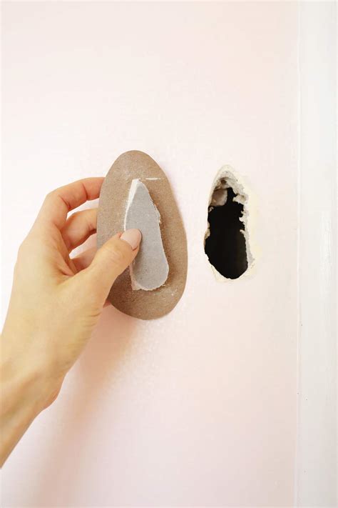 how to cover a hole in the wall