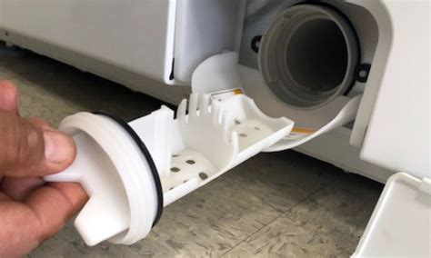 how to empty washing machine filter