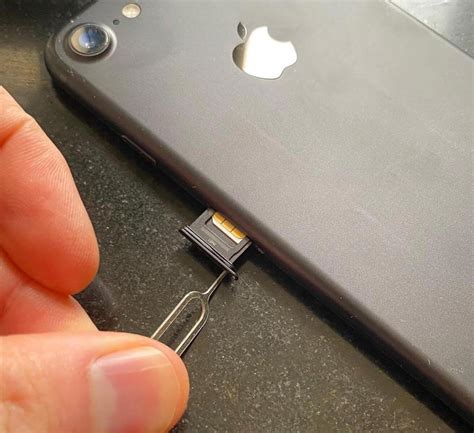 how to find sim on iphone xr