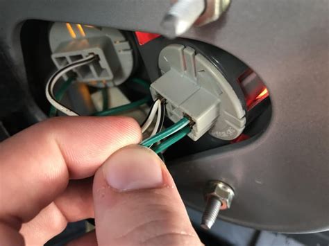 how to fix a loose tail light socket