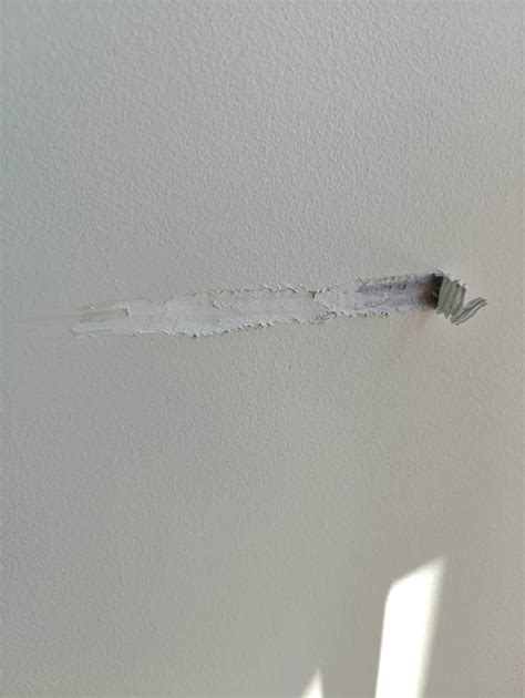 how to fix a scratch on a painted wall