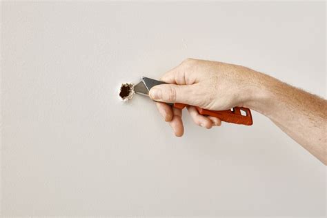 how to fix a small hole in drywall without a patch
