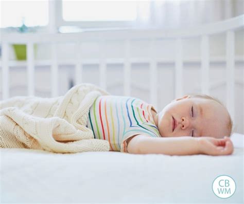 how to get a newborn to sleep in a crib
