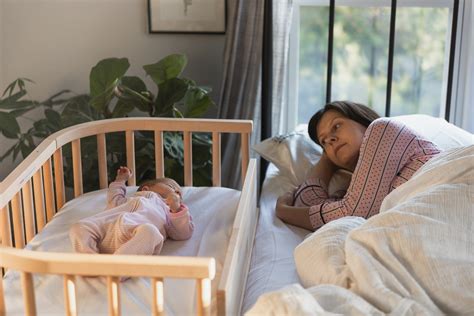 how to get baby to sleep in cot after co sleeping