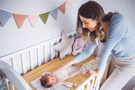 how to get newborn to sleep in crib instead of arms