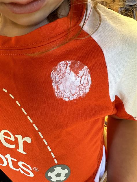 how to get stickers to stick to a shirt