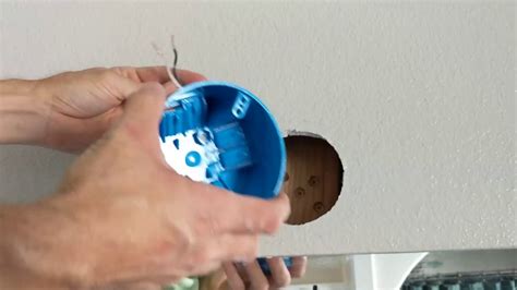 how to install a wall light fixture without a box