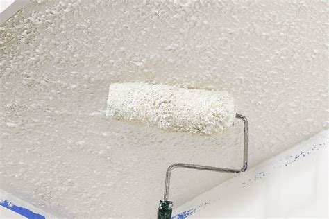 how to paint a popcorn ceiling with a roller
