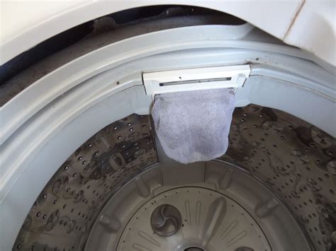 how to remove a whirlpool washing machine agitator
