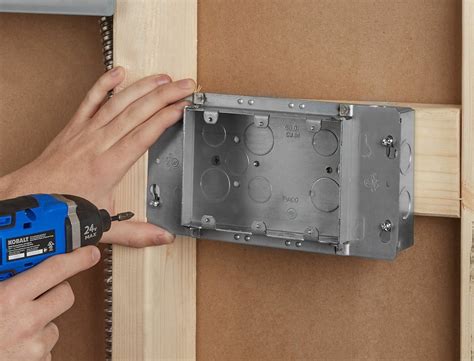 how to remove an outlet box from the wall