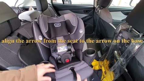 how to remove evenflo revolve car seat from base