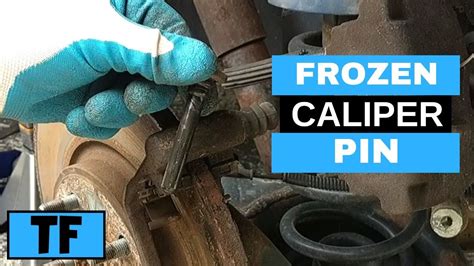 how to remove seized caliper slide pin