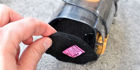 how to remove shark handheld filter