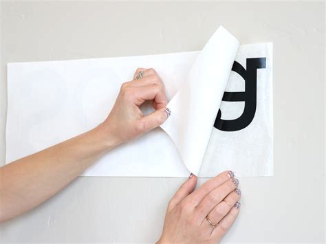 how to remove vinyl lettering from canvas