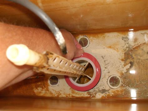 how to replace a flush valve gasket
