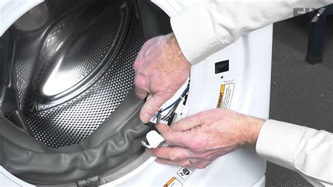how to replace door lock on whirlpool washer