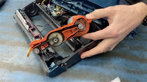 how to replace the belt on a shark rocket