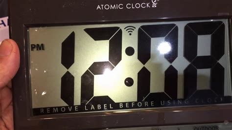 how to reset my sharp atomic clock