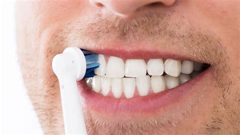 how to stop gum recession from brushing too hard