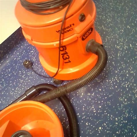 how to take brush out of vax hoover