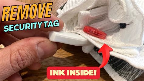 how to take off a security tag with ink without tools
