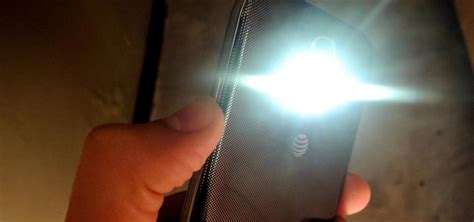 how to turn on flashlight with camera