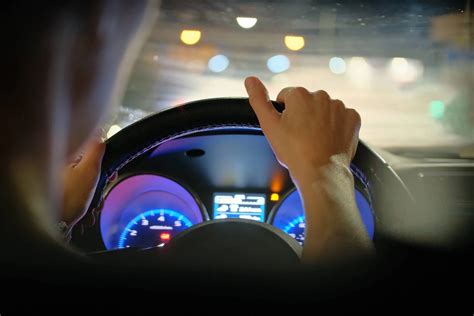 is it illegal to drive with the overhead light on