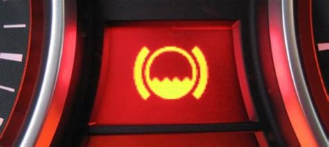 is it safe to drive with a low brake fluid warning light