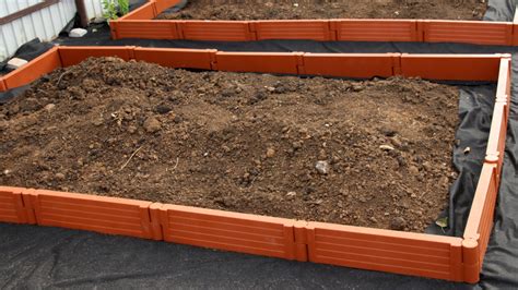 is it safe to line raised bed with plastic