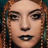 Biografia Mami Laquinn