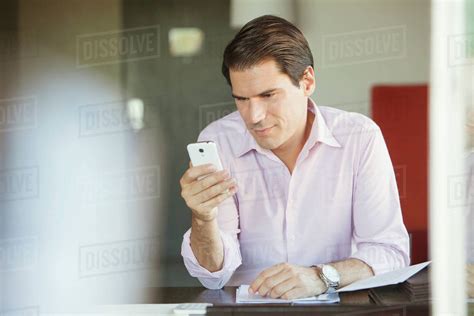 man checking smartphone