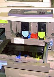 memperbaiki mesin fotocopy