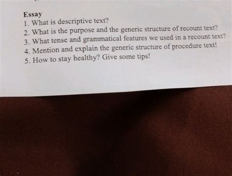 mention and describe the generic structure of a discussion text answer