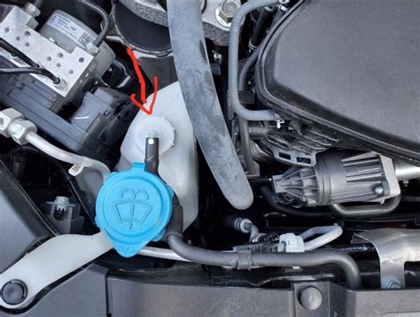 radiator overflow tank position