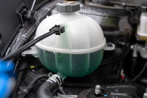 radiator overflow tank purpose