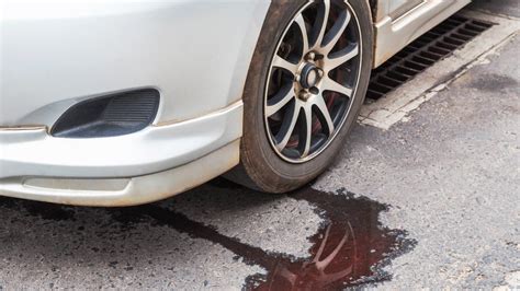 reddish fluid leaking from car while parked